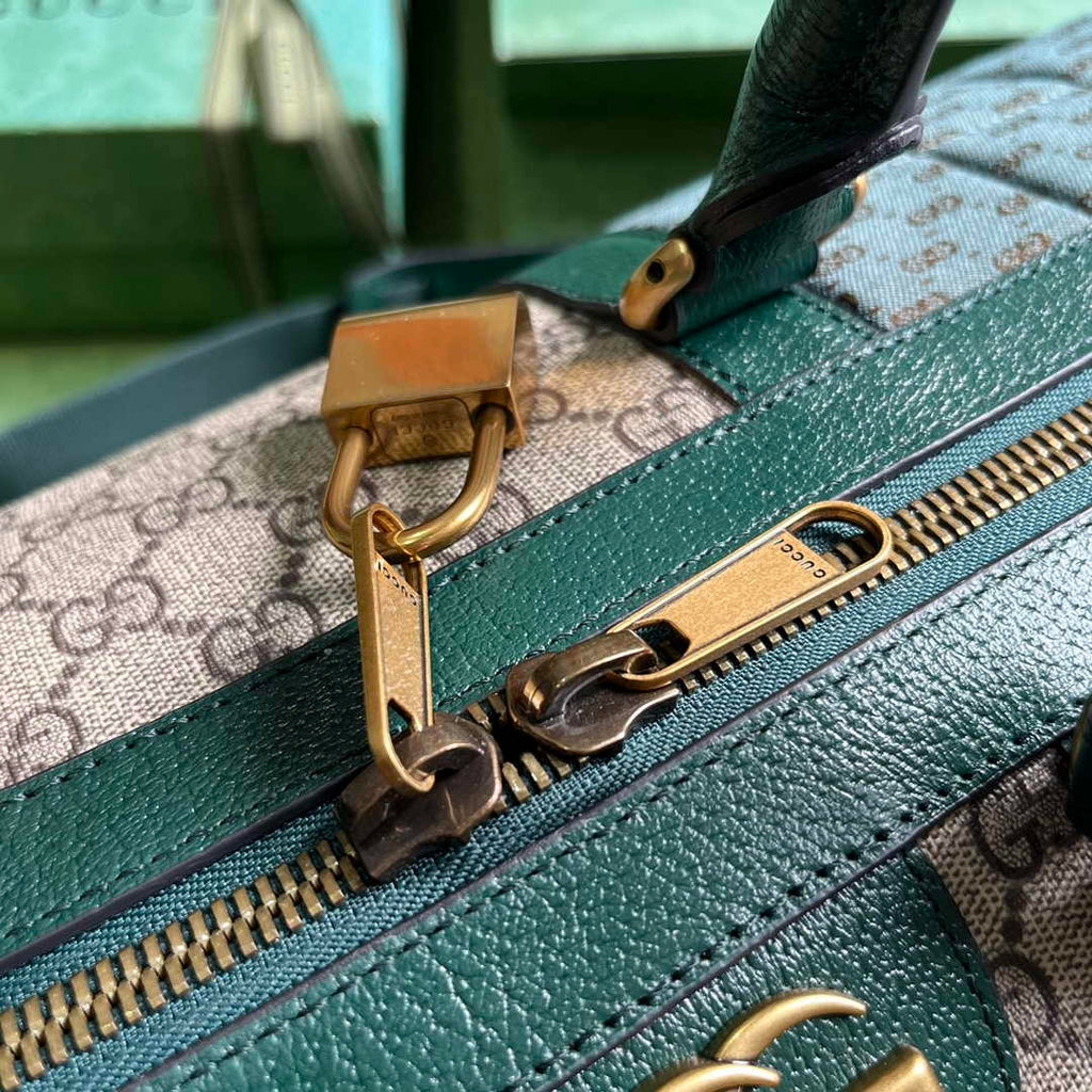 Gucci 724642 Mini GG canvas small duffle bag in Green leather