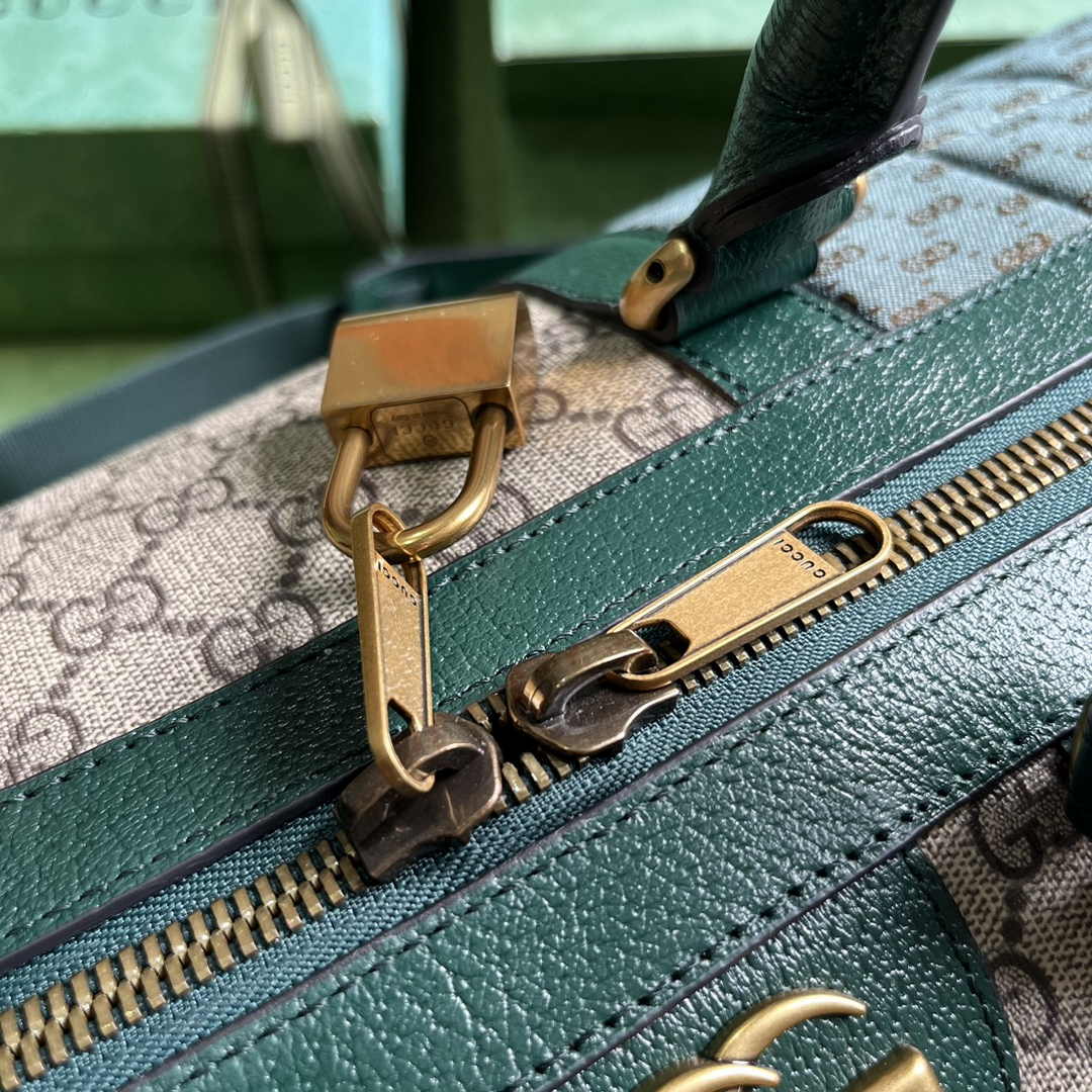 Gucci 724642 Mini GG canvas small duffle bag in Green leather