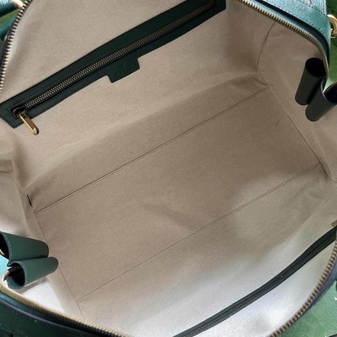 Gucci 724642 Mini GG canvas small duffle bag in Green leather