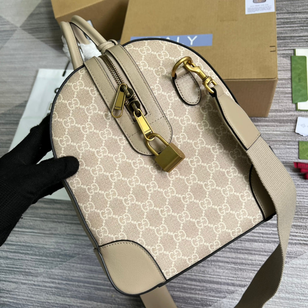 Gucci 724642 Savoy small duffle bag Beige and white GG Supreme canvas