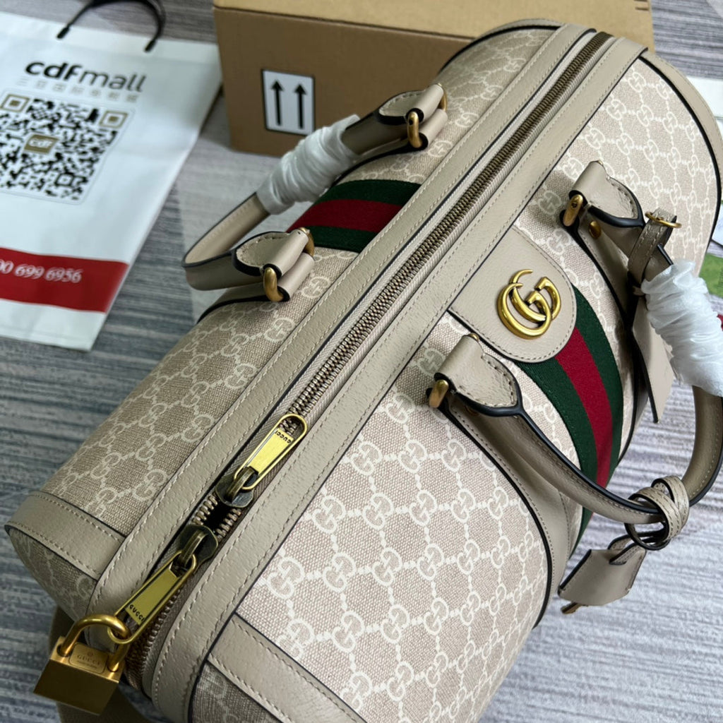 Gucci 724642 Savoy small duffle bag Beige and white GG Supreme canvas