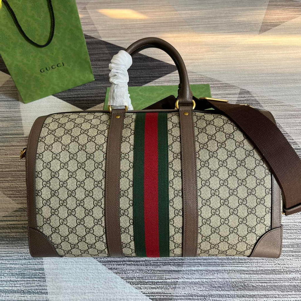Gucci 724642 Savoy small duffle bag in beige and ebony Supreme