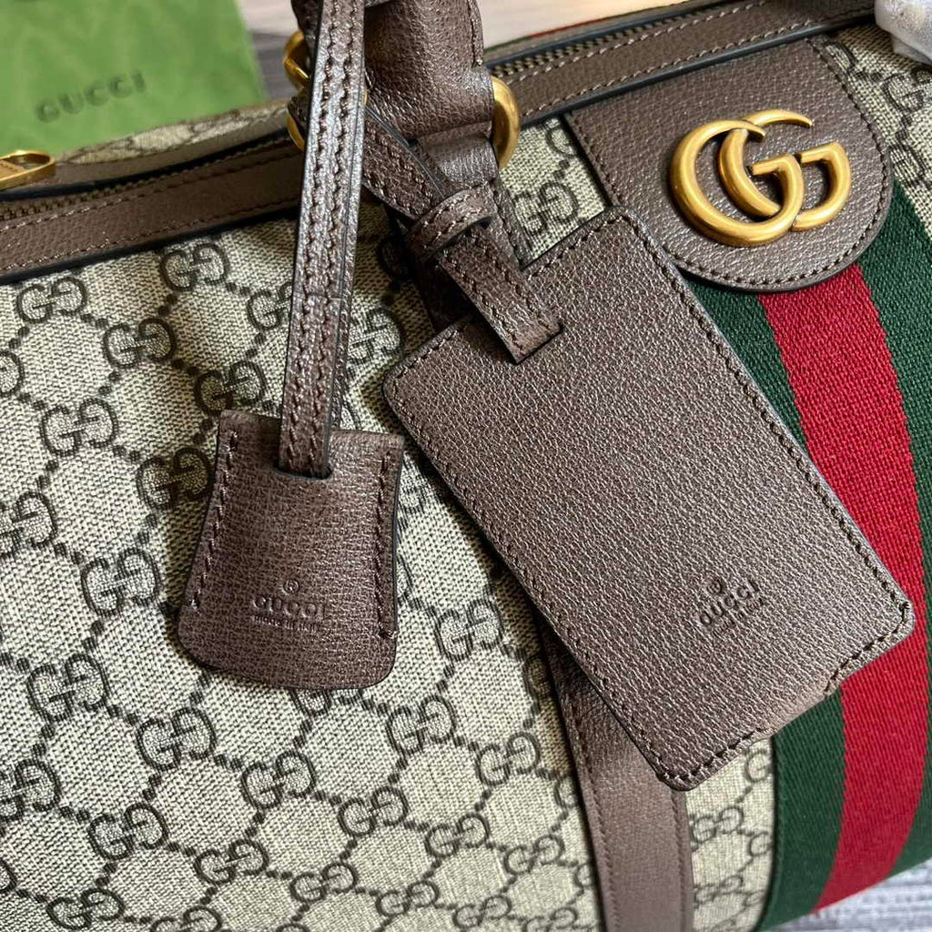 Gucci 724642 Savoy small duffle bag in beige and ebony Supreme