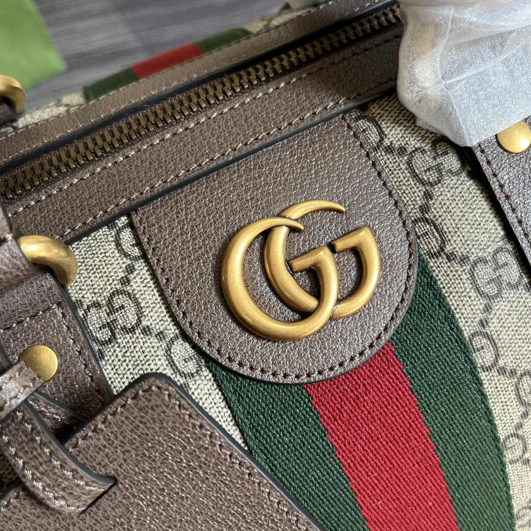 Gucci 724642 Savoy small duffle bag in beige and ebony Supreme
