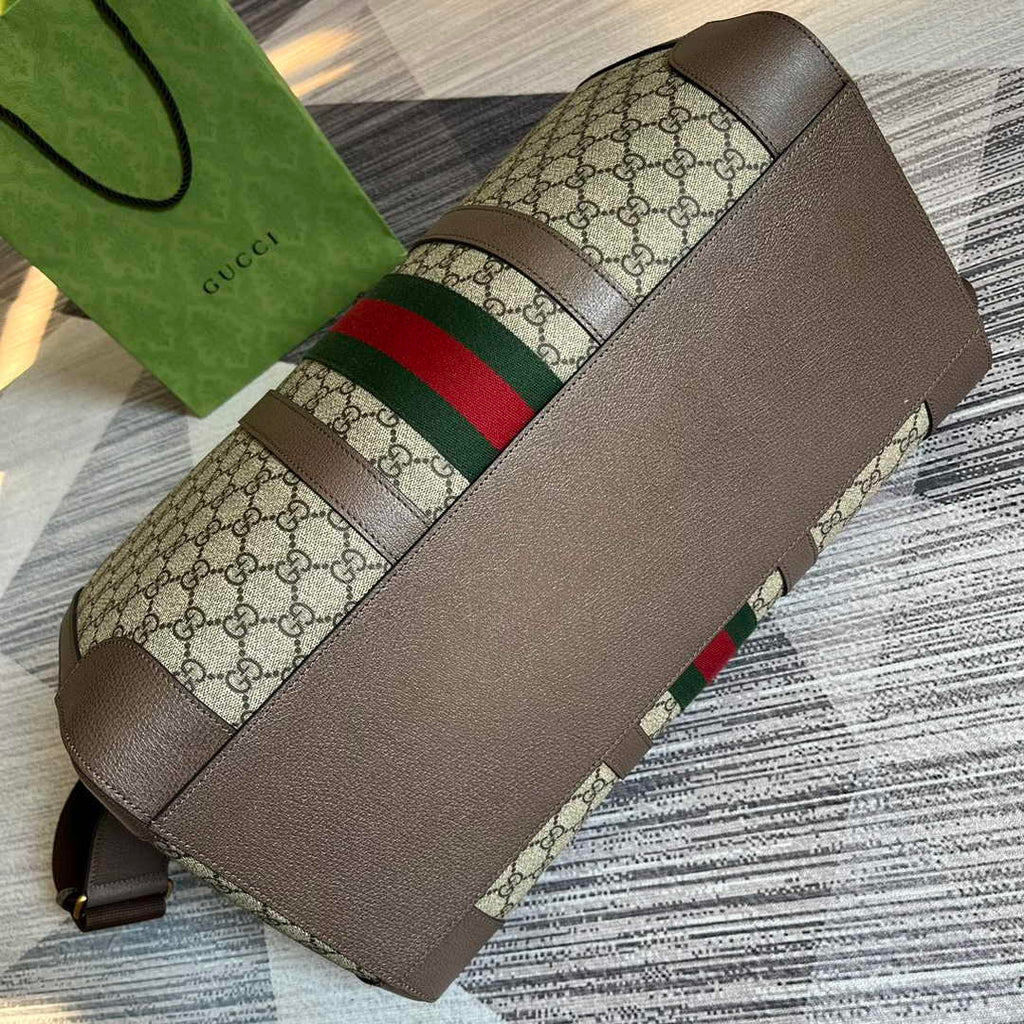 Gucci 724642 Savoy small duffle bag in beige and ebony Supreme