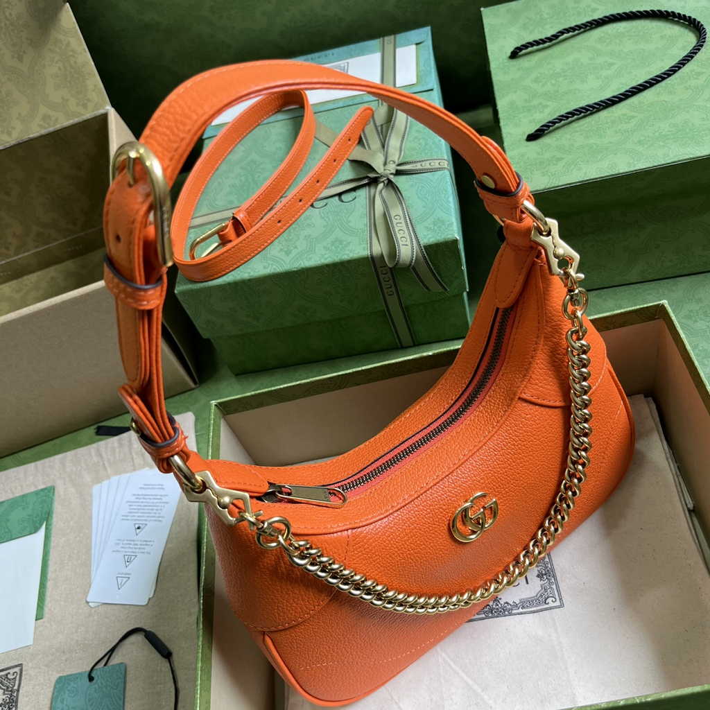 Gucci 731817 Aphrodite small shoulder bag in orange leather