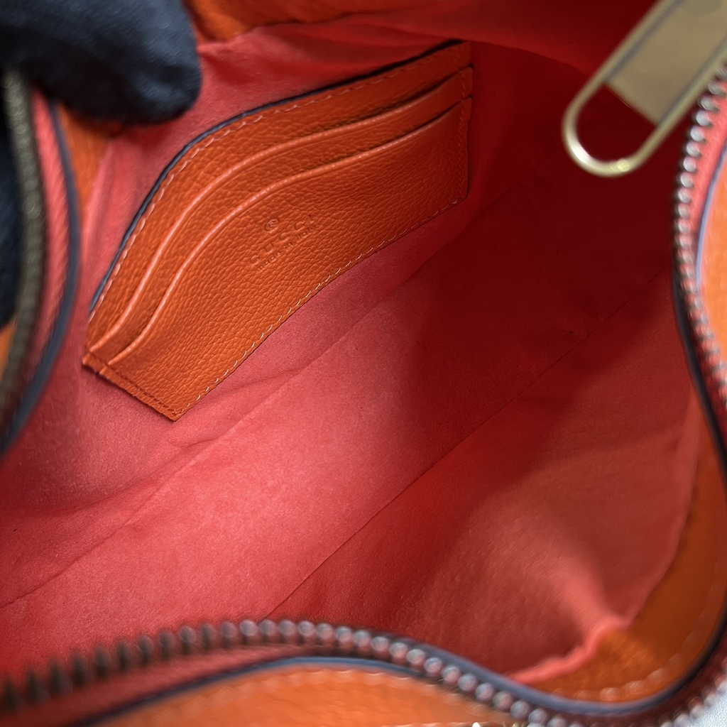 Gucci 731817 Aphrodite small shoulder bag in orange leather