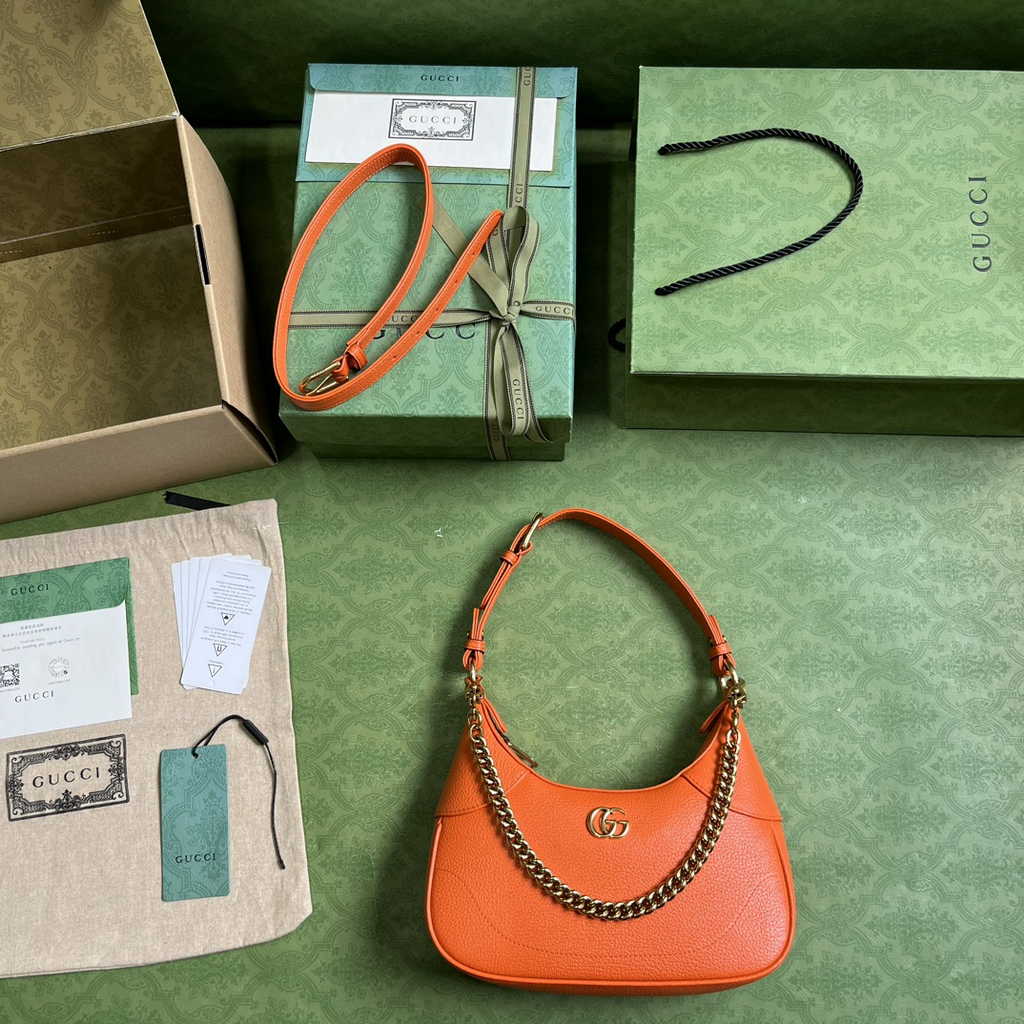 Gucci 731817 Aphrodite small shoulder bag in orange leather