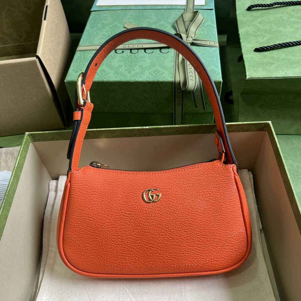 Gucci 739076 Aphrodite mini shoulder bag in orange leather
