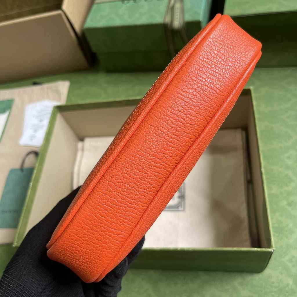 Gucci 739076 Aphrodite mini shoulder bag in orange leather