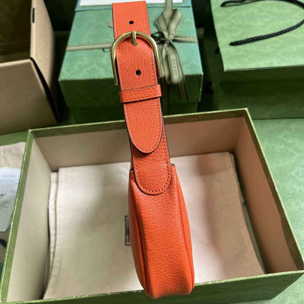 Gucci 739076 Aphrodite mini shoulder bag in orange leather