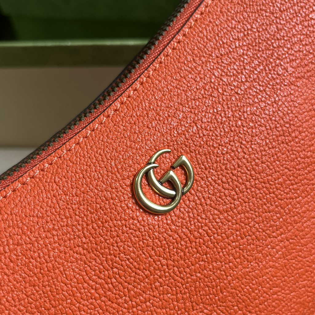Gucci 739076 Aphrodite mini shoulder bag in orange leather