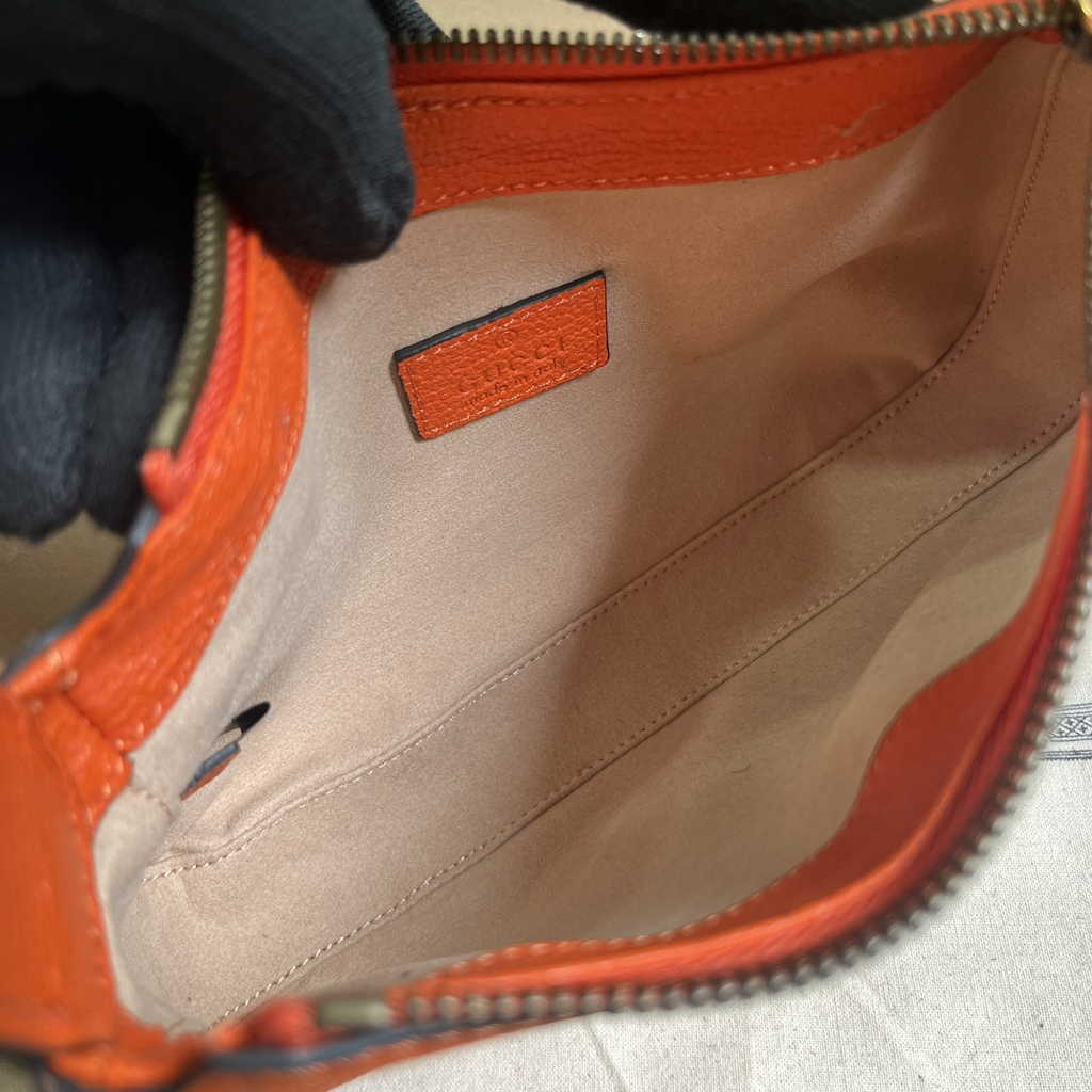 Gucci 739076 Aphrodite mini shoulder bag in orange leather
