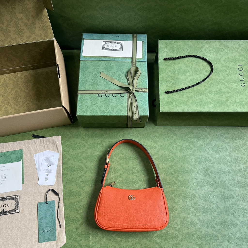 Gucci 739076 Aphrodite mini shoulder bag in orange leather