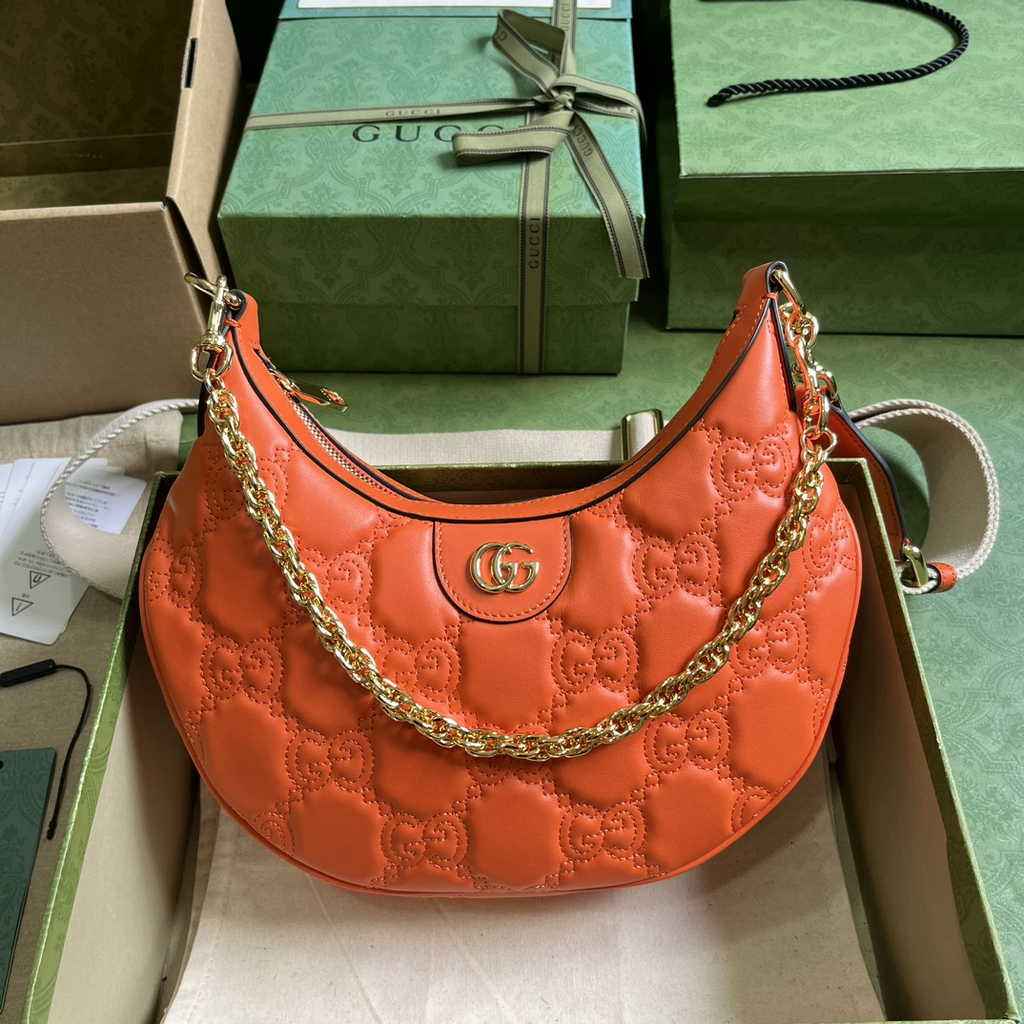 Gucci ‎739709 GG Matelassé small shoulder bag in orange leather