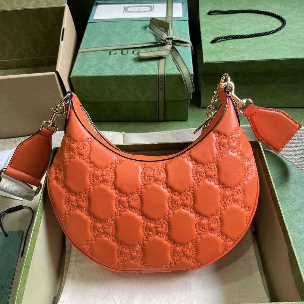 Gucci ‎739709 GG Matelassé small shoulder bag in orange leather