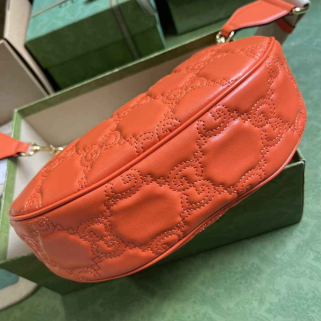 Gucci ‎739709 GG Matelassé small shoulder bag in orange leather