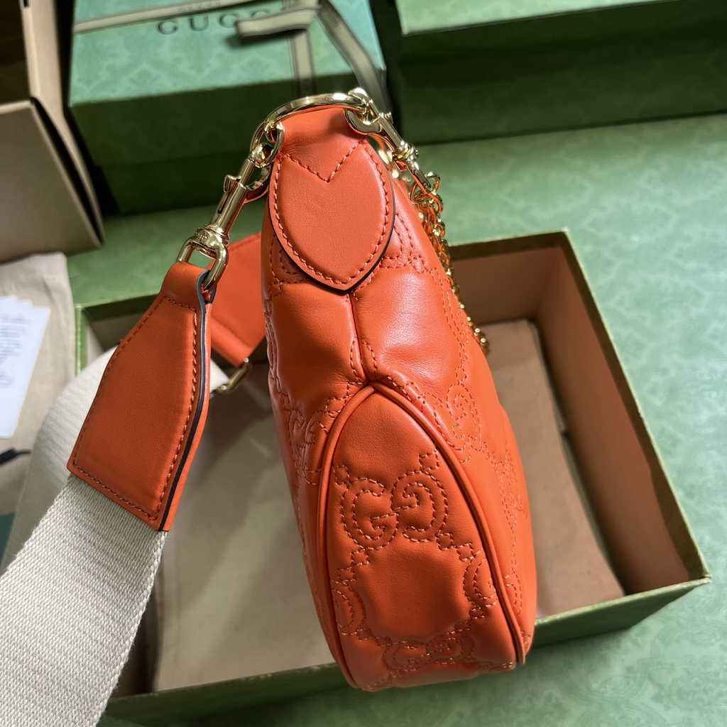 Gucci ‎739709 GG Matelassé small shoulder bag in orange leather
