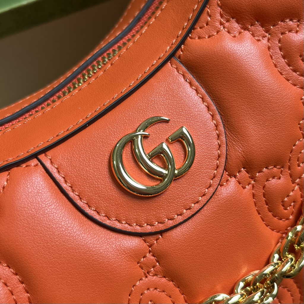 Gucci ‎739709 GG Matelassé small shoulder bag in orange leather