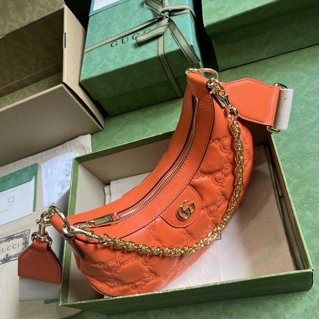 Gucci ‎739709 GG Matelassé small shoulder bag in orange leather