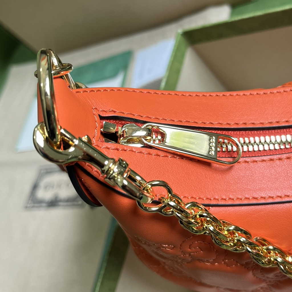 Gucci ‎739709 GG Matelassé small shoulder bag in orange leather