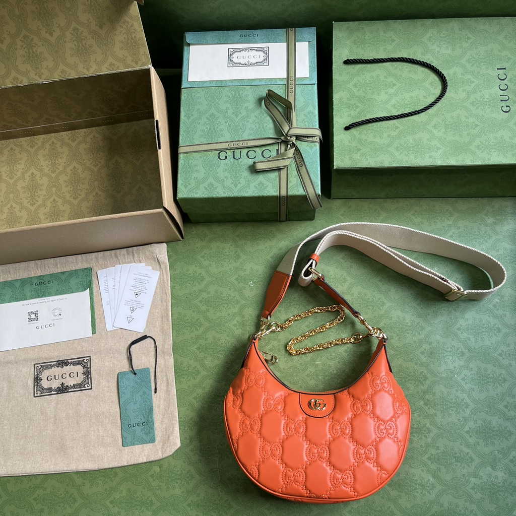Gucci ‎739709 GG Matelassé small shoulder bag in orange leather