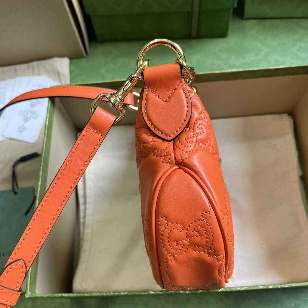Gucci ‎739736 GG Matelassé mini bag in Orange leather