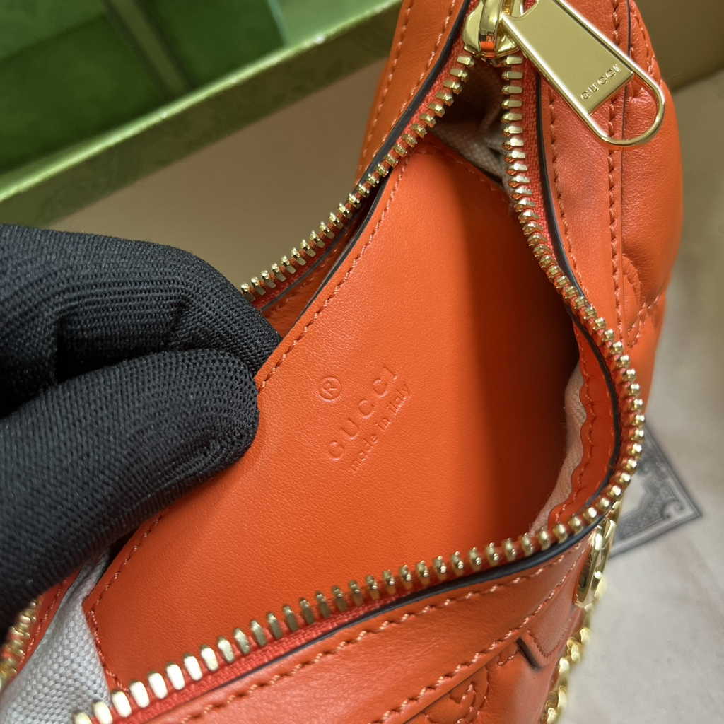 Gucci ‎739736 GG Matelassé mini bag in Orange leather