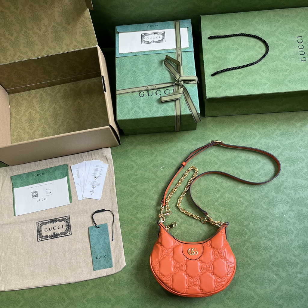 Gucci ‎739736 GG Matelassé mini bag in Orange leather