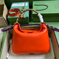 Gucci 746124 Diana medium shoulder bag in orange leather