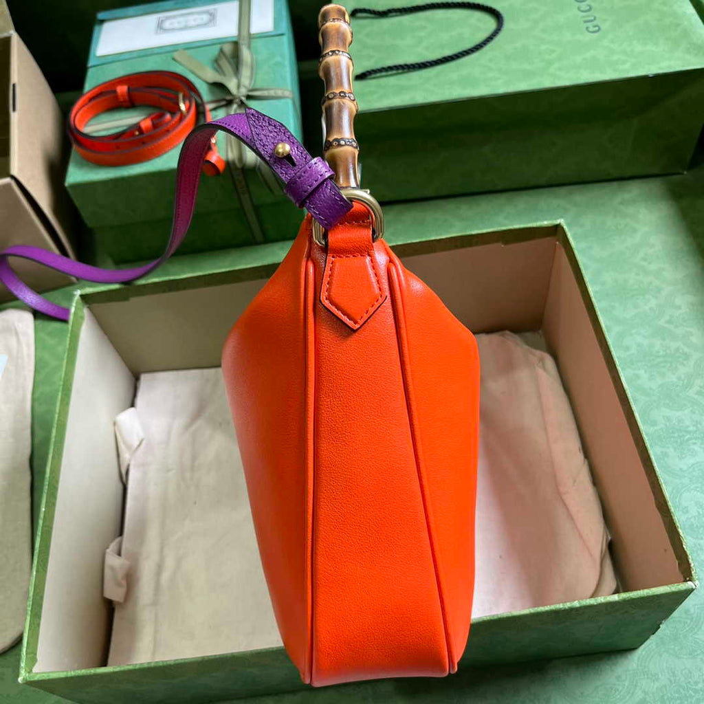 Gucci 746124 Diana medium shoulder bag in orange leather