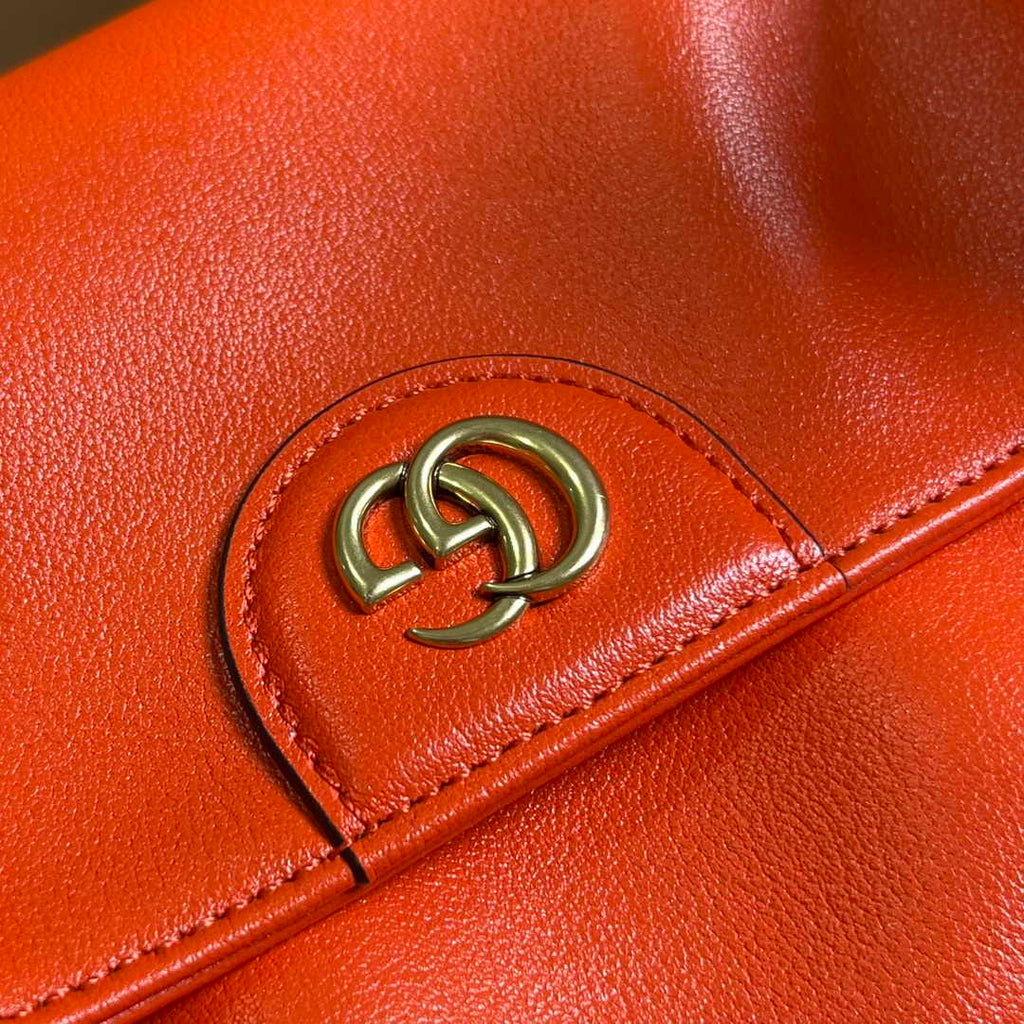 Gucci 746124 Diana medium shoulder bag in orange leather