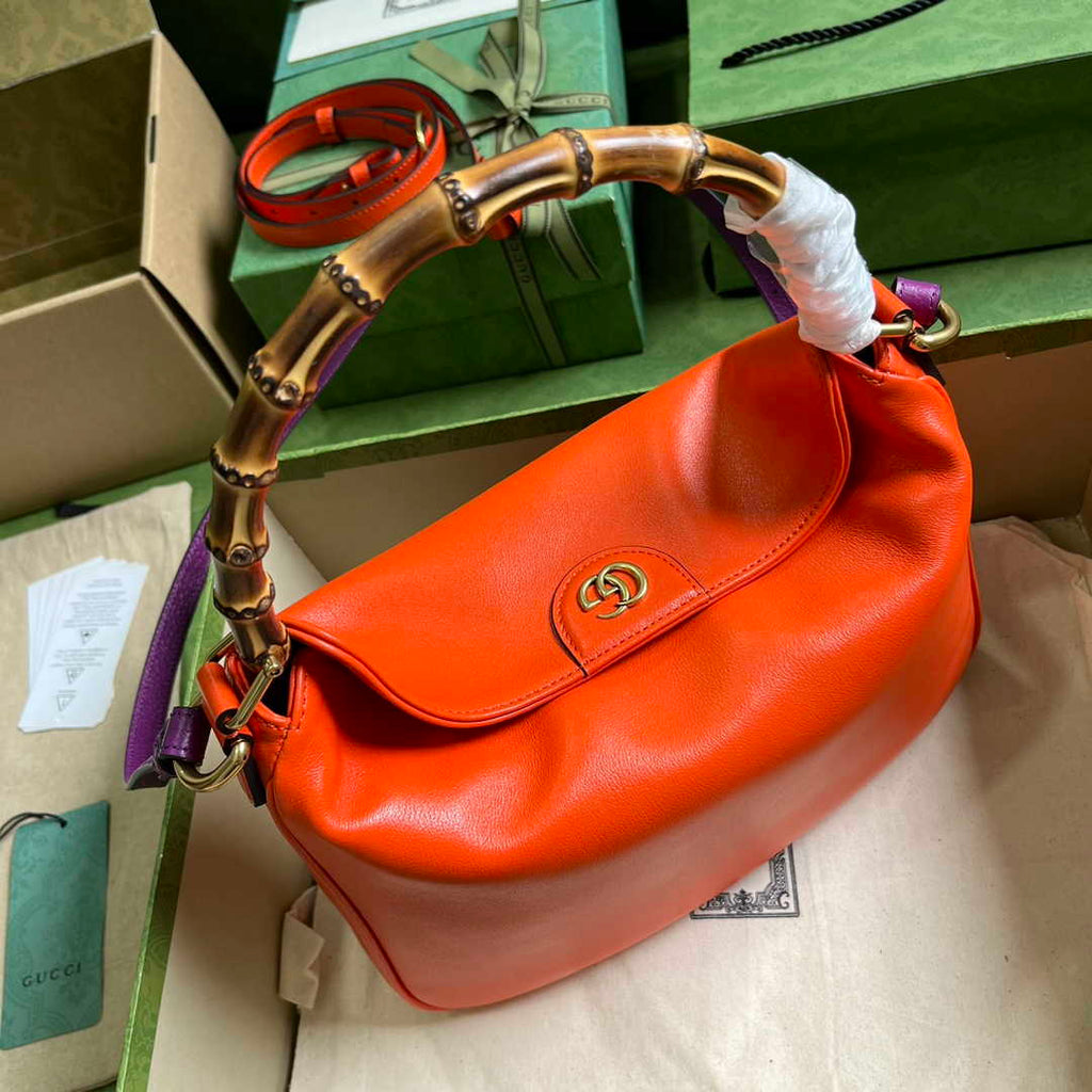 Gucci 746124 Diana medium shoulder bag in orange leather