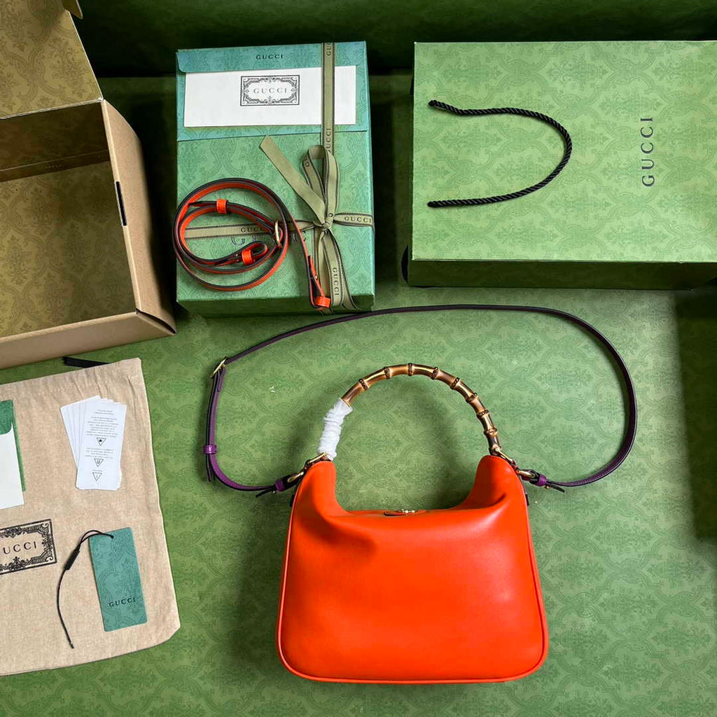 Gucci 746124 Diana medium shoulder bag in orange leather