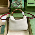 Gucci 746251 Diana small shoulder bag in beige leather