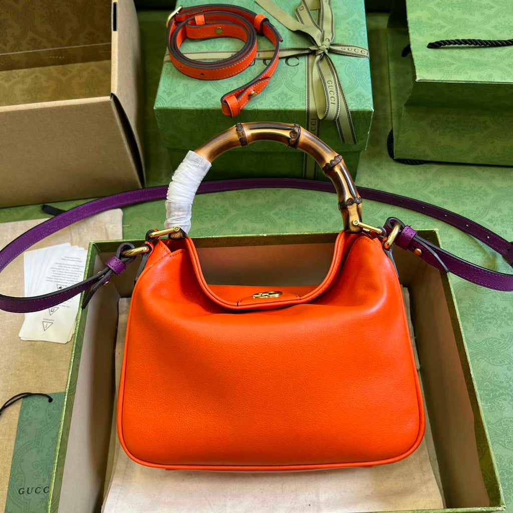 Gucci 746251 Diana small shoulder bag in orange leather