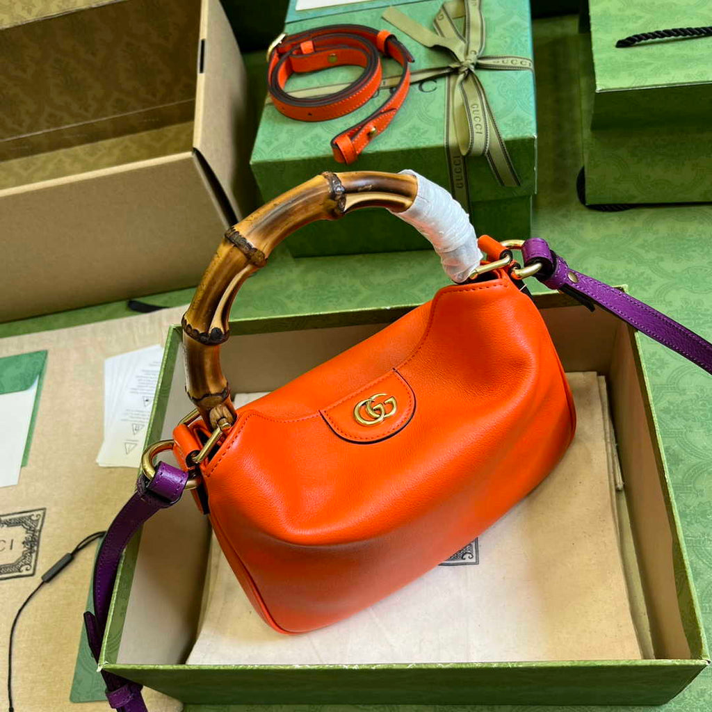 Gucci 746251 Diana small shoulder bag in orange leather