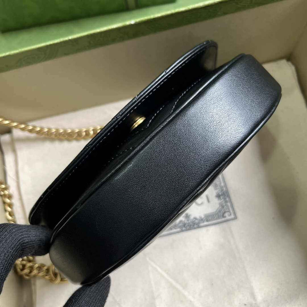 Gucci 746431 GG Marmont matelassé chain mini bag in black leather