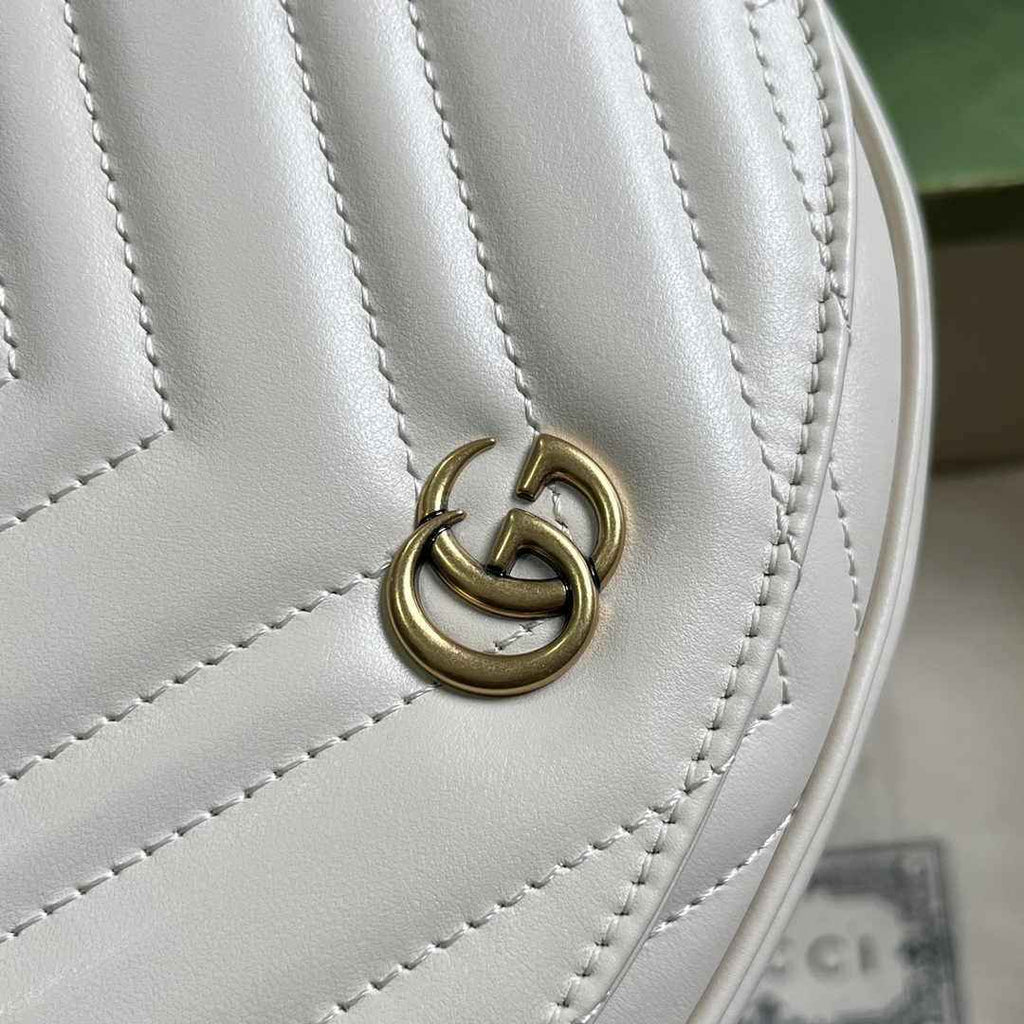 Gucci 746431 GG Marmont matelassé chain mini bag in beige leather