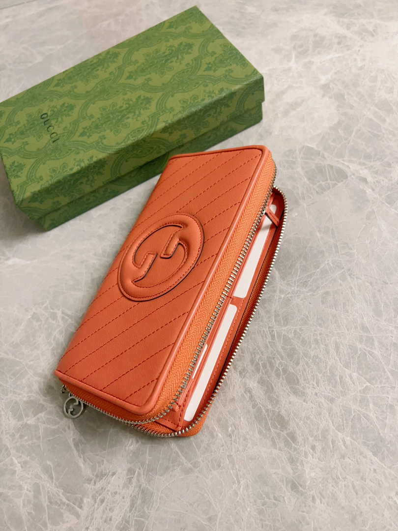 Gucci Blondie zip-around wallet 760312 in orange leather