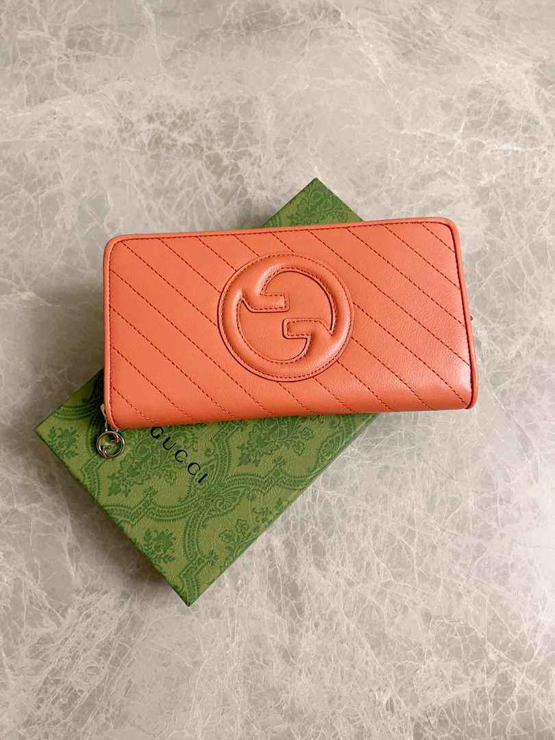 Gucci Blondie zip-around wallet 760312 in orange leather