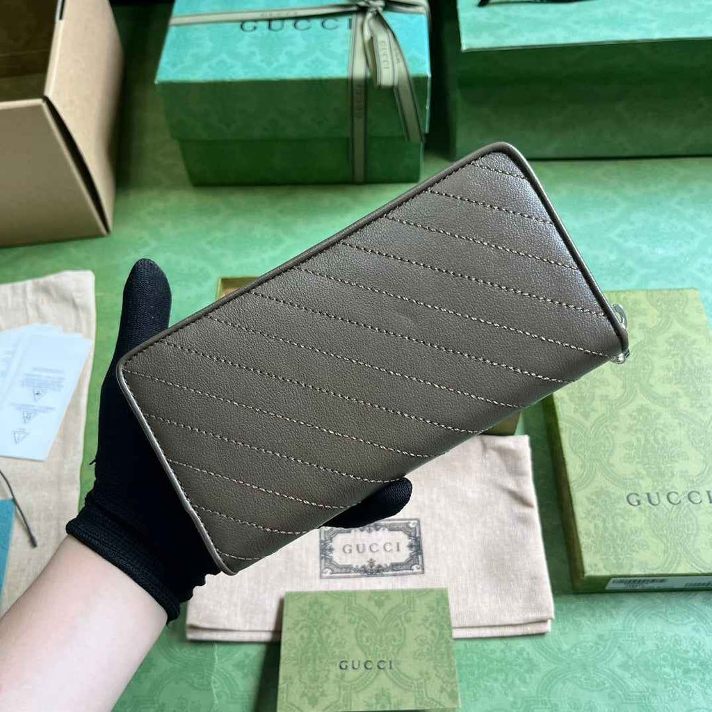 Gucci Blondie zip-around wallet 760312 in dark green leather