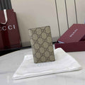 Gucci GG Emblem bi-fold card case, 821209 in beige fabric