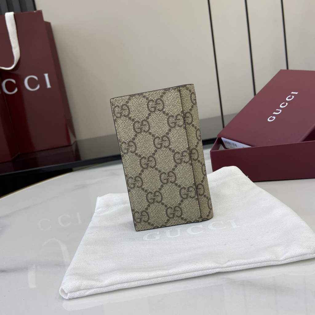 Gucci GG Emblem bi-fold card case, 821209 in beige fabric