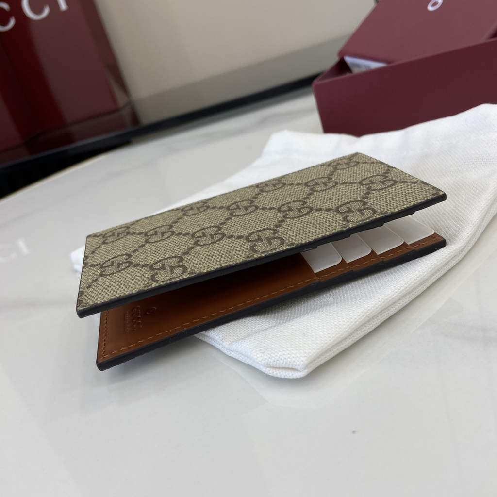 Gucci GG Emblem bi-fold card case, 821209 in beige fabric