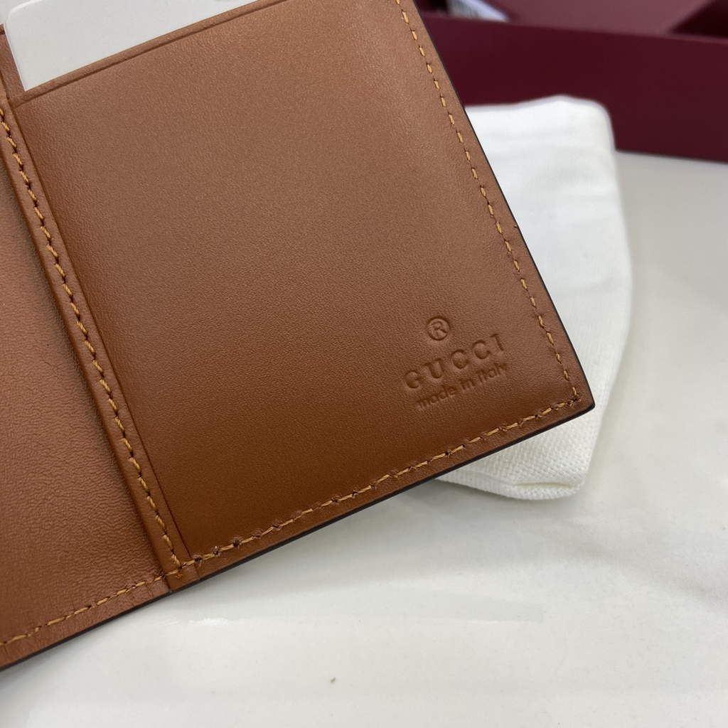 Gucci GG Emblem bi-fold card case, 821209 in beige fabric