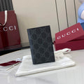 Gucci GG Emblem bi-fold card case, 821209 in black fabric