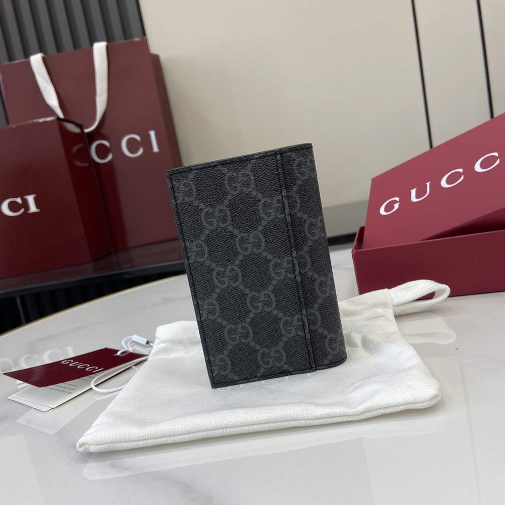 Gucci GG Emblem bi-fold card case, 821209 in black fabric