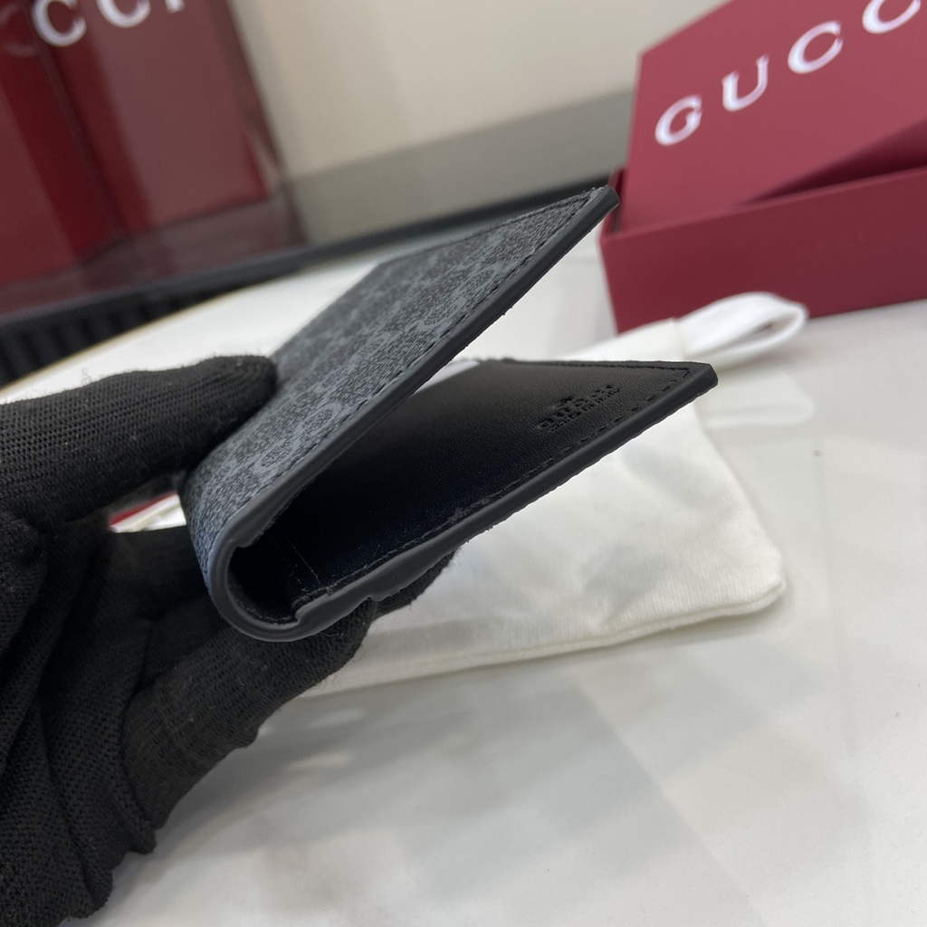 Gucci GG Emblem bi-fold card case, 821209 in black fabric