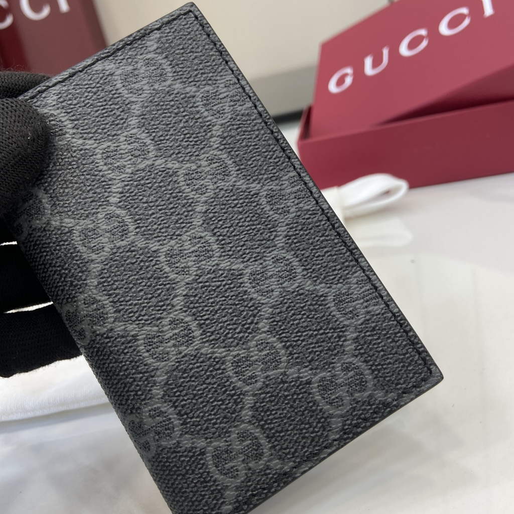 Gucci GG Emblem bi-fold card case, 821209 in black fabric